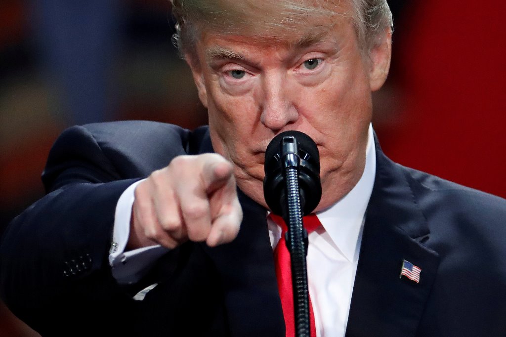 US President Donald Trump speaks at a rally in Pensacola, Florida, U.S., December 8, 2017. REUTERS/Carlo Allegri
