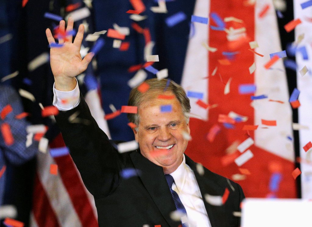 Democratic Alabama US Senate candidate Doug Jones acknowledges supporters at the election night party in Birmingham, Alabama, US, December 12, 2017. REUTERS/Marvin Gentry 