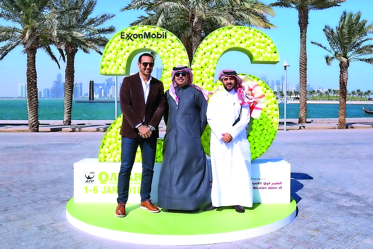 Saleh Al Mana, Vice President and Director of Government and Public Affairs for ExxonMobil Qatar; Tareq Zeinal, Secretary General Assistant of Qatar Tennis Federation and Karim Alami, Tournament Director pose for a picture, after kick starting a series of