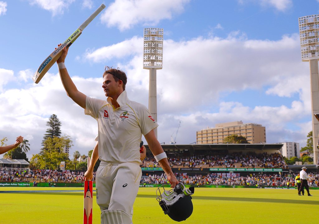 Australia's captain Steve Smith celebrates with team mate Mitchell Marsh as they walk off the field at the end of the third day of the third Ashes cricket test match. REUTERS/David Gray