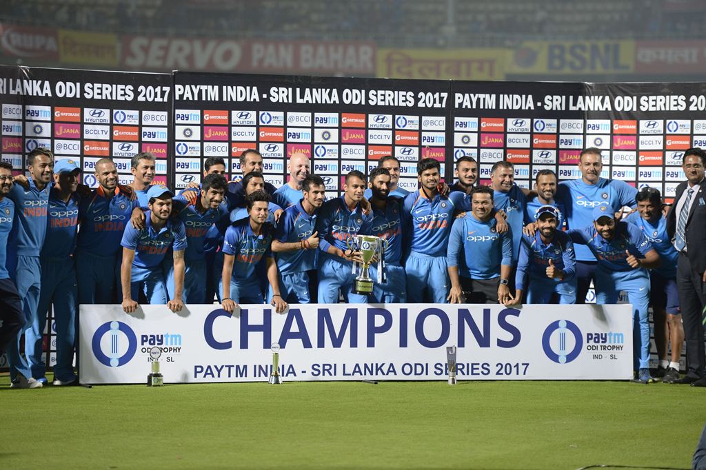 Indian cricket team pose as they hold the One Day series cup after wining the third One Day International (ODI) cricket match between India and Sri Lanka at the Dr. Y.S. Rajasekhara Reddy ACA-VDCA Cricket Stadium in Visakhapatnam on December 17, 2017. (AF