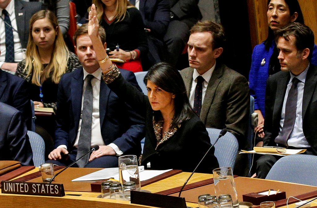 An image of the US Ambassador to the United Nations Nikki Haley vetos an Egyptian-drafted resolution regarding recent decisions concerning the status of Jerusalem, during the United Nations Security Council meeting on the situation in the Middle East, inc