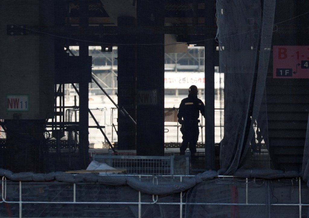 A man works at the construction site of the New National Stadium, main stadium of Tokyo 2020 Olympics and Paralympics, in Tokyo. The nation’s unemployment rate stood at 2.7 percent last month, the lowest since 1993. REUTERS.