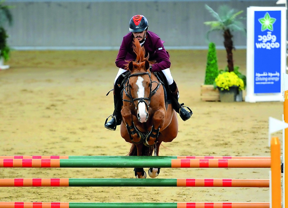 Qatari rider Hamad Nasser Al Qadi guides Galwaybay Merbreaker over an obstacle during the fourth leg of Hathab Series at Al Shaqab Arena in this file photo.