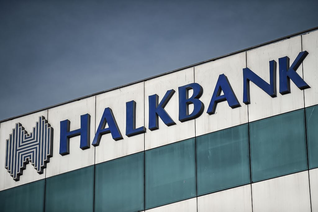 (FILES) This file photo taken on December 2, 2017 shows the logo of the Turkish Halkbank in Istanbul. AFP / OZAN KOSE