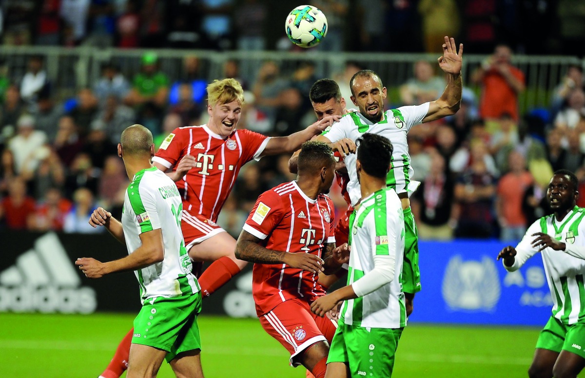 FC Bayern Munich and Al Ahli players vie for the ball possession during their friendly match played at Aspire Zone yesterday. Sandro Wagner scored his first goal since returning to Bayern Munich as the German side beat QSL team 6-0. Pic: Abdul Basit / The