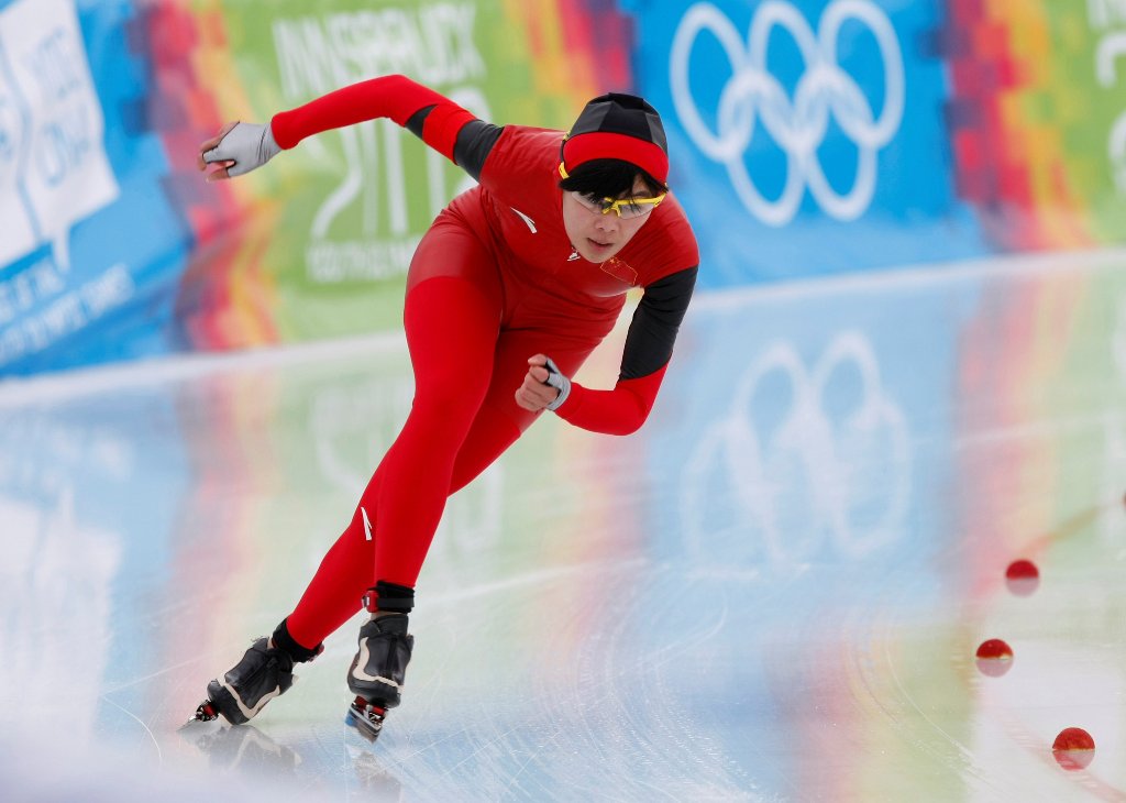 A file photo China's Xiaoxuan Shi skates in the women's 500m speed skating event at the first winter Youth Olympic Games in Innsbruck January 14, 2012. REUTERS/Christian Forcher/File photo