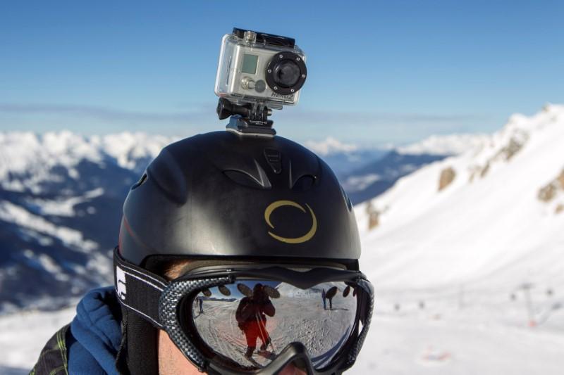 A GoPro camera is seen on a skier's helmet as he rides down the slopes in the ski resort of Meribel, French Alps, January 7, 2014. Reuters/Emmanuel Foudrot