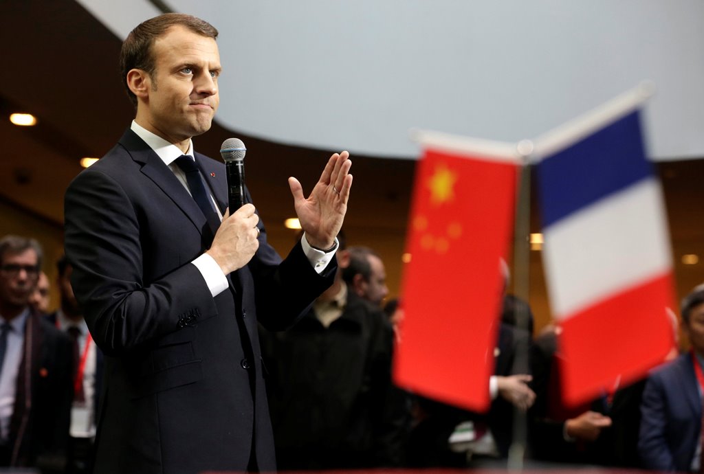 French President Emmanuel Macron speaks at a France-Chinese forum on the applications of artificial intelligence at SOHO 3Q in Beijing, China January 9, 2018. Reuters/Jason Lee
