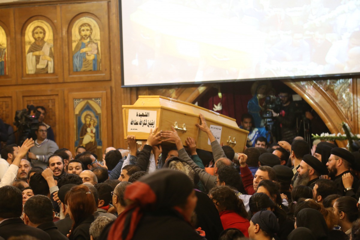 Egyptians gather at Mary Church during the funeral ceremony of the Mar Mina Church attacks victims in Helwan City, south of Cairo, Egypt on December 29, 2017 (Anadolu Agency) 
