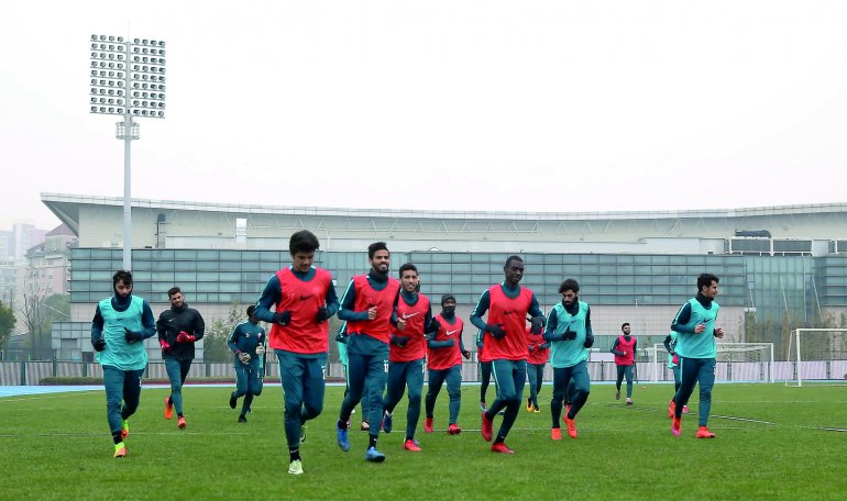 Qatar Under-23 football team players taking part in a training session ahead of  the match against Palestine