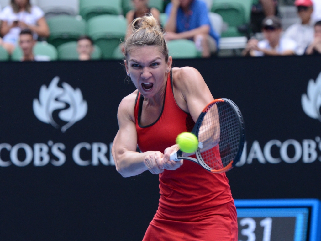 Simona Halep in action Lauren Davis (not seen) of United States during 2018 Australia Open Women's Singles tennis match in Melbourne, Australia on January 20, 2018. (Recep ?akar - Anadolu Agency)