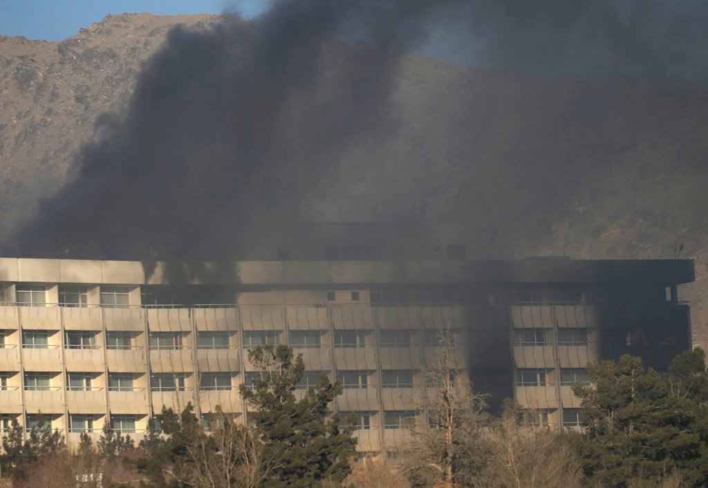 Smoke rises from the Intercontinental Hotel during an attack in Kabul, Afghanistan January 21, 2018. REUTERS/Mohammad Ismail