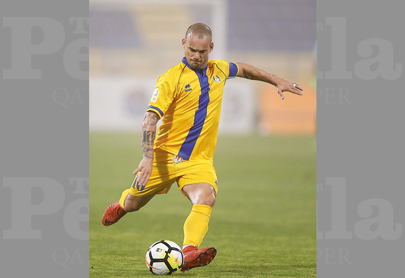 Al Gharafa’s Dutch star Wesley Sneijder in action against Umm Salal during the QNB Stars League match played at Thani Bin Jassim Stadium yesterday.