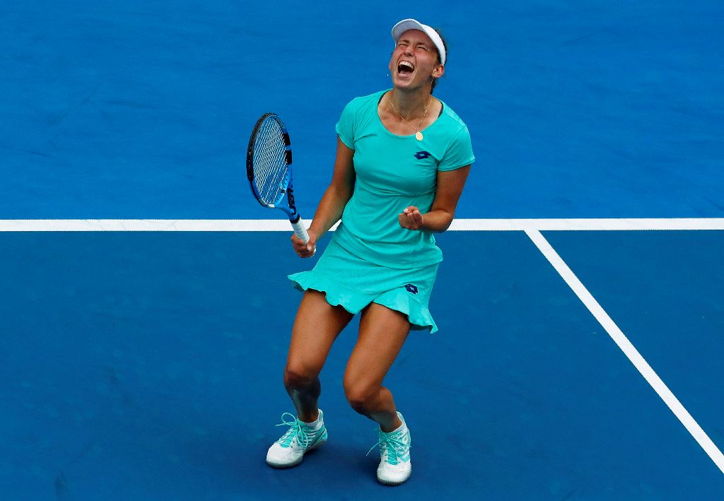 Elise Mertens of Belgium celebrates winning against Petra Martic of Croatia. REUTERS/David Gray