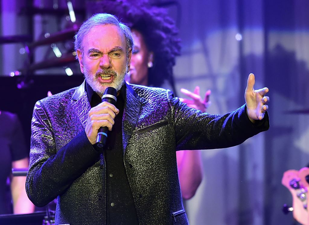 (FILES) This file photo taken on February 11, 2017 shows singer Neil Diamond performing during the annual Clive Davis pre-Grammy gala at the Beverly Hilton Hotel. AFP / Frederic J. BROWN