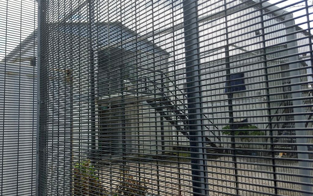 FILE PHOTO: Security fences surround buildings inside the Manus Island detention centre in Papua New Guinea, February 11, 2017. Behrouz Boochani/Handout via REUTERS 