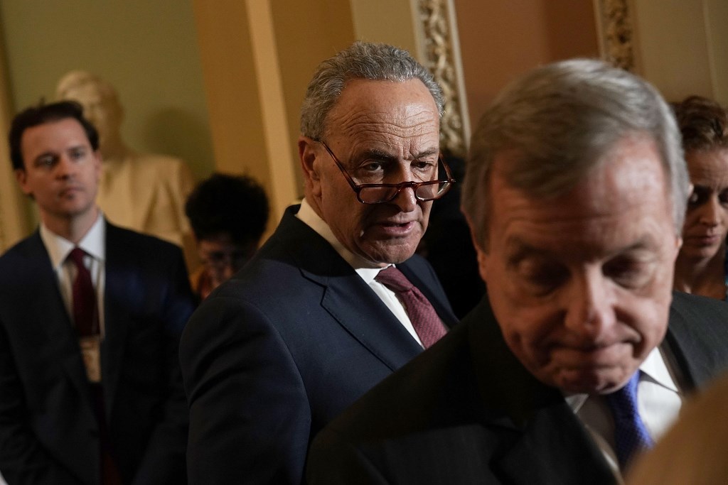 WASHINGTON: U.S. Senate Minority Leader Sen. Chuck Schumer (D-NY) (2nd R) and Senate Minority Whip Sen. Dick Durbin (D-IL) (R) during a media briefing after a weekly Senate Democratic Policy Luncheon January 23, 2018 at the U.S. Capitol in Washington, DC.