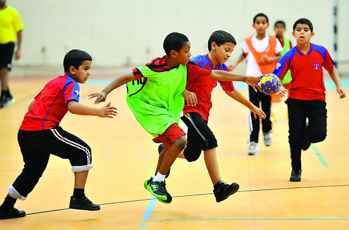School students playing handball during an interschool match at the Schools Olympic Program (SOP) in Doha in this file picture.