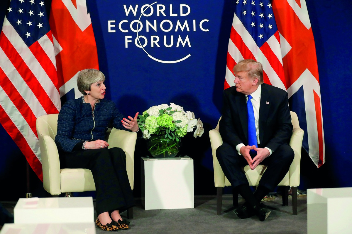 U.S. President Donald Trump meets with Britain's Prime Minister Theresa May during the World Economic Forum (WEF) annual meeting in Davos, Switzerland, January 25, 2018 Reuters/Carlos Barria