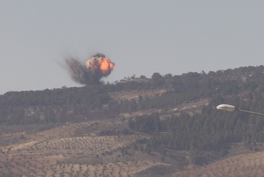 A photo taken from Turkey's Kilis province, on January 28, 2018 shows smokes rising at Burseya Mountain as Turkish military aircrafts and howitzers continue to hit PYD/PKK terror group targets within the 'Operation Olive Branch' launched in Syria's Afrin.