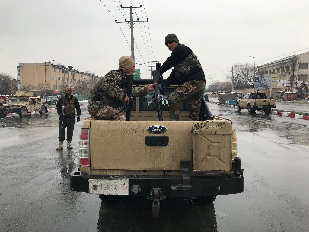 Afghan national army soldiers arrive near the Marshal Fahim military academy after a series of explosions in Kabul, Afghanistan January 29, 2018. REUTERS/Mohammad Ismail	
