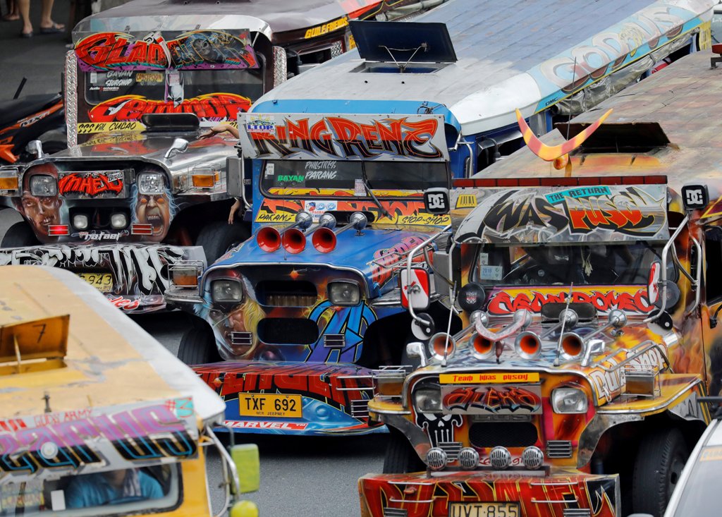 A file photo of a row of jeepneys are seen plying a road in Quezon City, Metro Manila, Philippines January 20, 2018. REUTERS/Dondi Tawatao 