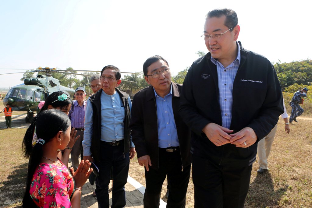 Surakiart Sathirathai (R), a former Thai foreign minister and chairman of the international advisory board on the crisis in Rakhine state, visits one of the camps set up by Myanmar's Social Welfare, Relief and Resettlement Minister for the repatriation of
