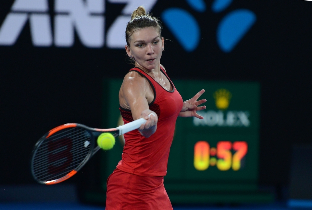 Simona Halep of Romania in action against Caroline Wozniacki (not seen) of Denmark during the women's singles final on day 13 of the 2018 Australian Open at Melbourne Park in Melbourne, Australia on January 27, 2018. Recep ?akar - Anadolu