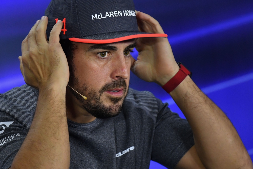 This file photo taken on November 23, 2017 shows McLaren's Spanish driver Fernando Alonso attend the drivers' press conference ahead of the Abu Dhabi Formula One Grand Prix at the Yas Marina circuit. Two time ex world champion Fernando Alonso will make hi