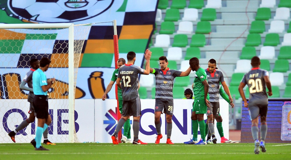 Al Duhail skipper Youssef Msakni (centre) celebrates with team-mates after scoring his third goal against Al Ahli during their QNB Stars League match played at Al Ahli Stadium yesterday. Picture: Baher Amin/The Peninsula