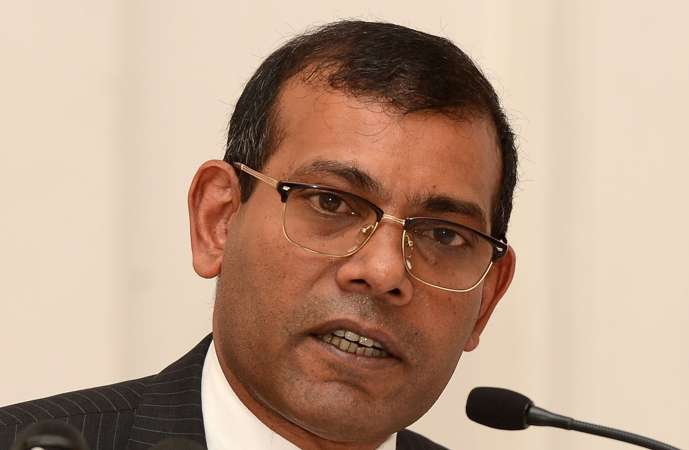 In this file photo taken on January 22, 2018 former President of the Maldives Mohamed Nasheed addresses a press conference in Colombo.  / AFP / LAKRUWAN WANNIARACHCHI 