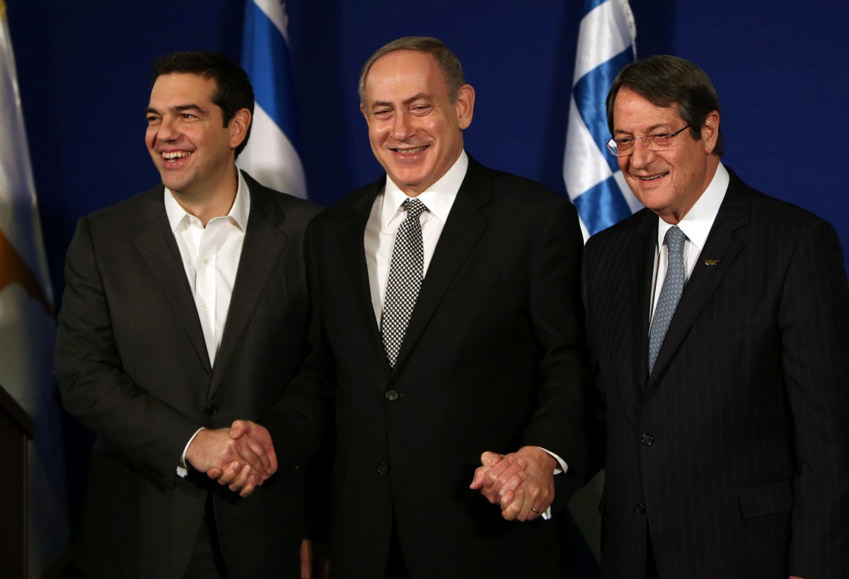 Israeli PM Benjamin Netanyahu hosts Greek PM Alexis Tsipras and Cypriot President Nicos Anastasiades during a trilateral meeting in Jerusalem on December 8, 2016.  AFP / Gali Tibbon