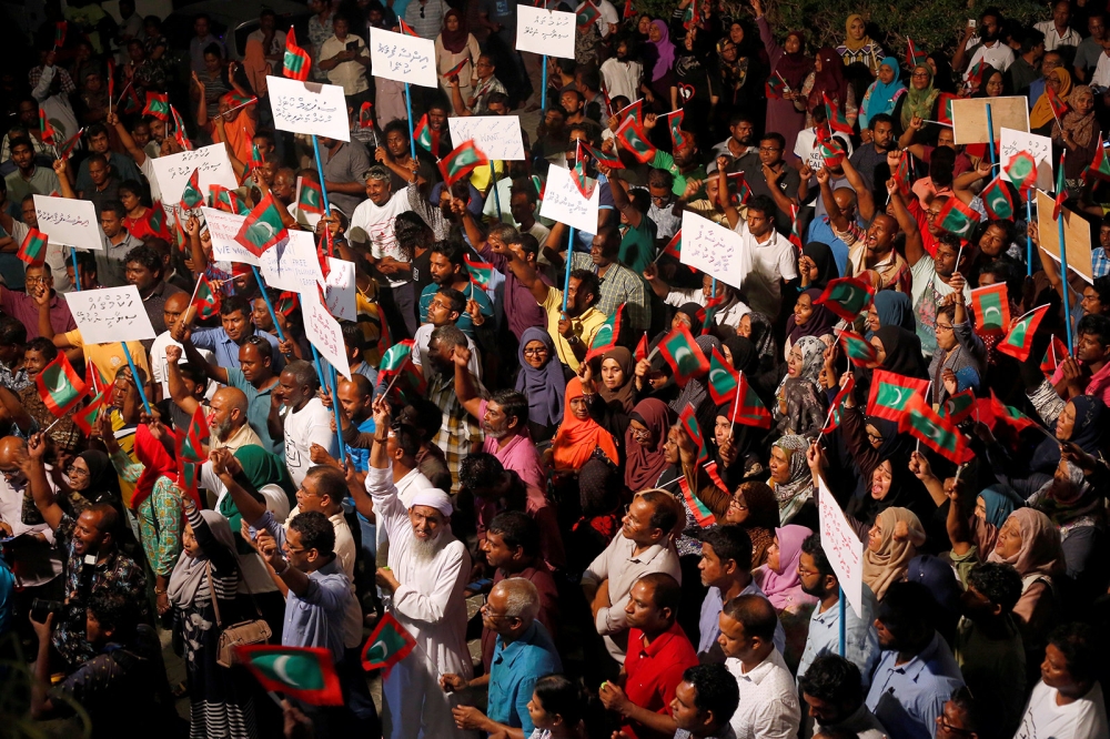 Opposition supporters protest against the government's delay in releasing their jailed leaders, including former president Mohamed Nasheed, despite a Supreme Court order, in Male, Maldives, February 4, 2018. Reuters