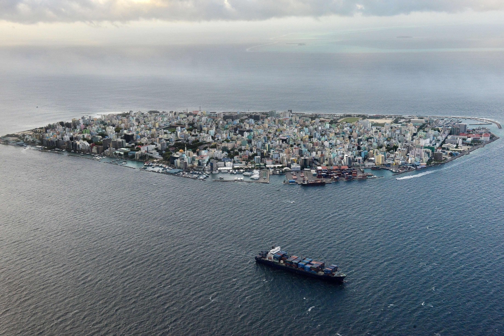 (FILES) This file photo taken on September 9, 2013 shows an aerial view of the island of Male, capital of the Maldives. AFP / Roberto SCHMIDT
