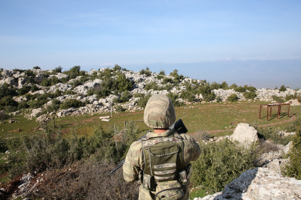 Turkish soldiers are seen after they took control of an area including PYD/PKK's training camp located in western site of Afrin within the 