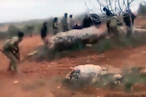 Armed with an automatic pistol, the badly wounded pilot opened fire on the rebels closing in on him and then blew himself up with a hand grenade to avoid capture.