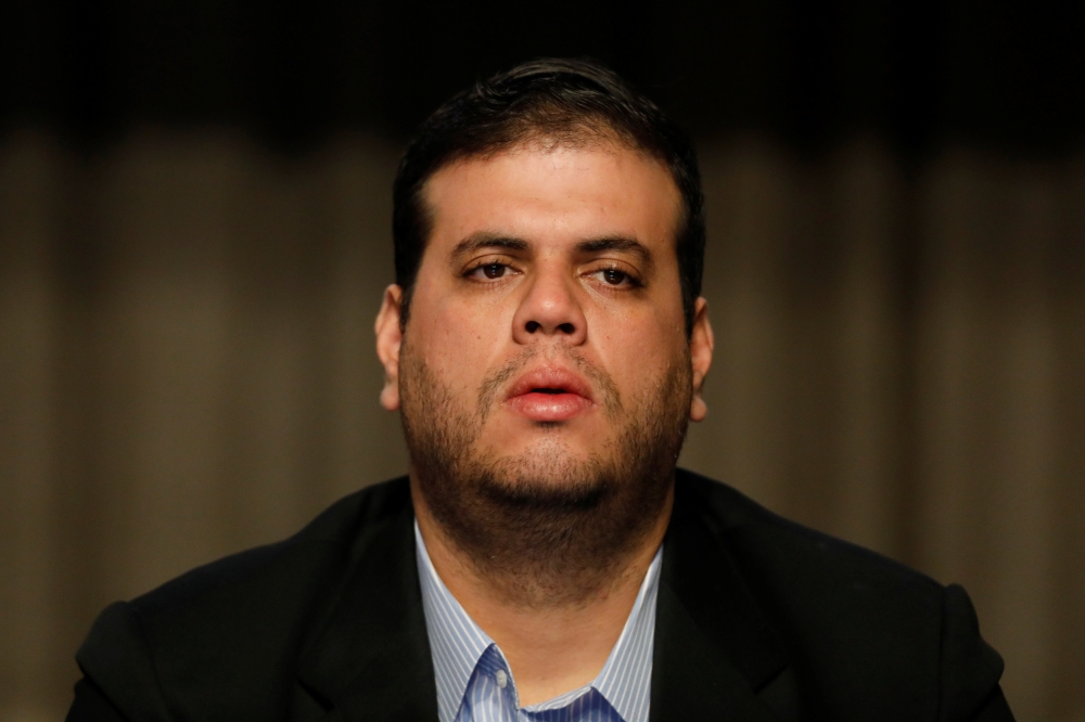 National superintendent of cryptocurrencies Carlos Vargas attends a news conference regarding the new cryptocurrency the Petro, in Caracas, Venezuela, January 31, 2018. Reuters/Marco Bello