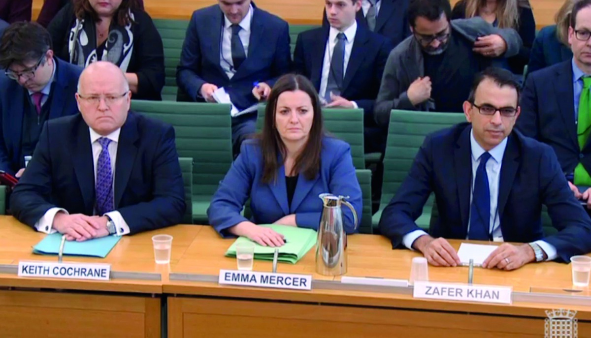 A video grab from footage broadcast by the UK Parliament's Parliamentary Recording Unit (PRU) on February 6, 2018 shows (L-R) Carillion CEO, Keith Cochrane, Finance director Emma Mercer and formeer Finance director Zafer Khan answering questions at a join