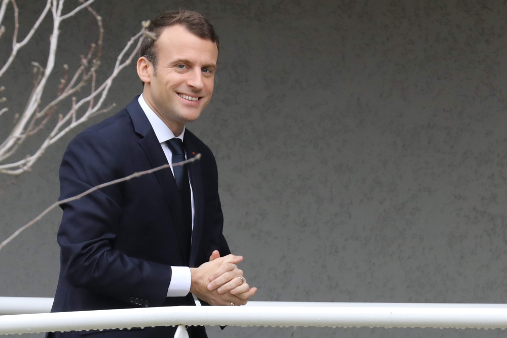 French president Emmanuel Macron arrives to visit the National Institute of Agricultural Research (INRA) on Febuary 7, 2018, in San Giuliano near Bastia, on the French Mediterranean island of Corsica.  AFP / Ludovic MARIN