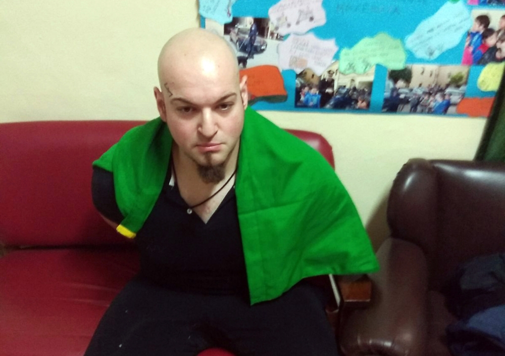 This handout picture released by the Italian Carabinieri Press Office on February 3, 2018 shows an Italian man arrested for suspected of wounding several foreign nationals in a drive-by shooting in Macerata.  AFP Photo /Italian Carabinieri Press Office