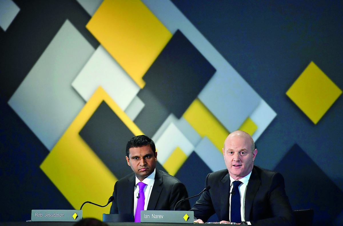 Australia's Commonwealth Bank CEO Ian Narev (R) briefs the media regarding the bank's half year result as chief financial officer Rob Jesudason (L) looks on in Sydney on February 7, 2018. AFP / Saeed Khan