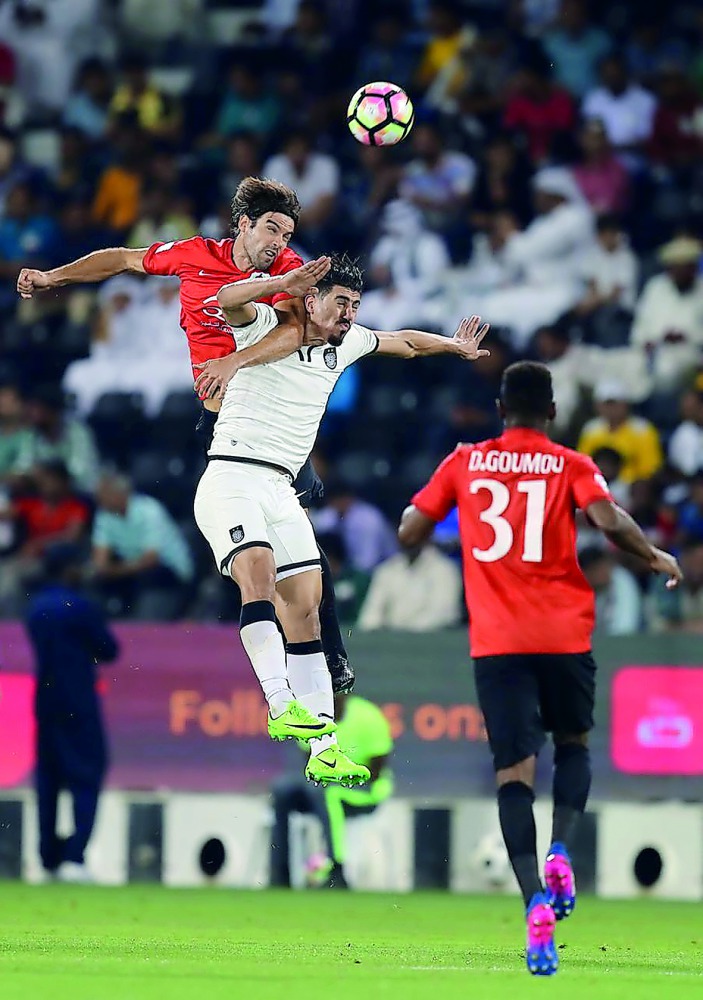 Al Sadd and Al Rayyan players vie for the ball possession during a QNB Stars League match in this file photo.