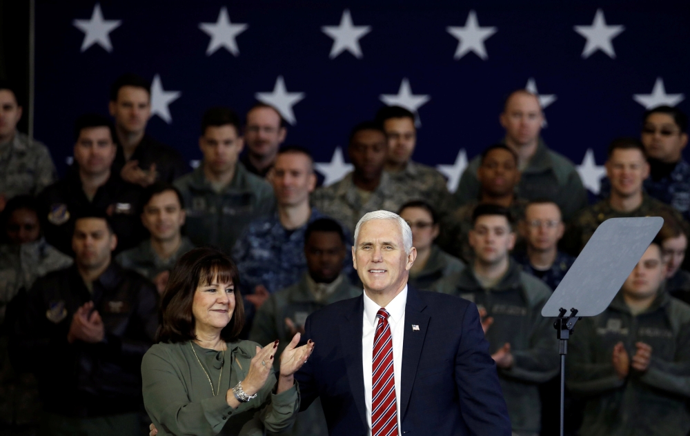 U.S. Vice President Mike Pence arrives with his wife Karen to address members of U.S. military services and Japan Self-Defense Force (JSDF) before he departs for South Korea, at U.S. Air Force Yokota base in Fussa, on the outskirts of Tokyo, Japan, Februa