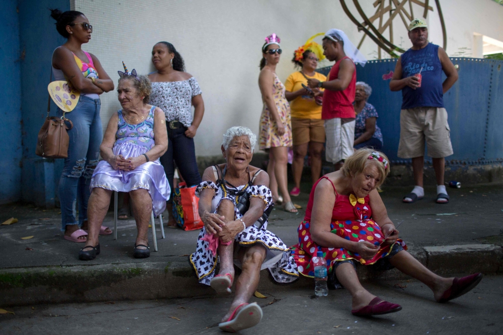 Revellers celebrate the street carnival parade of the 