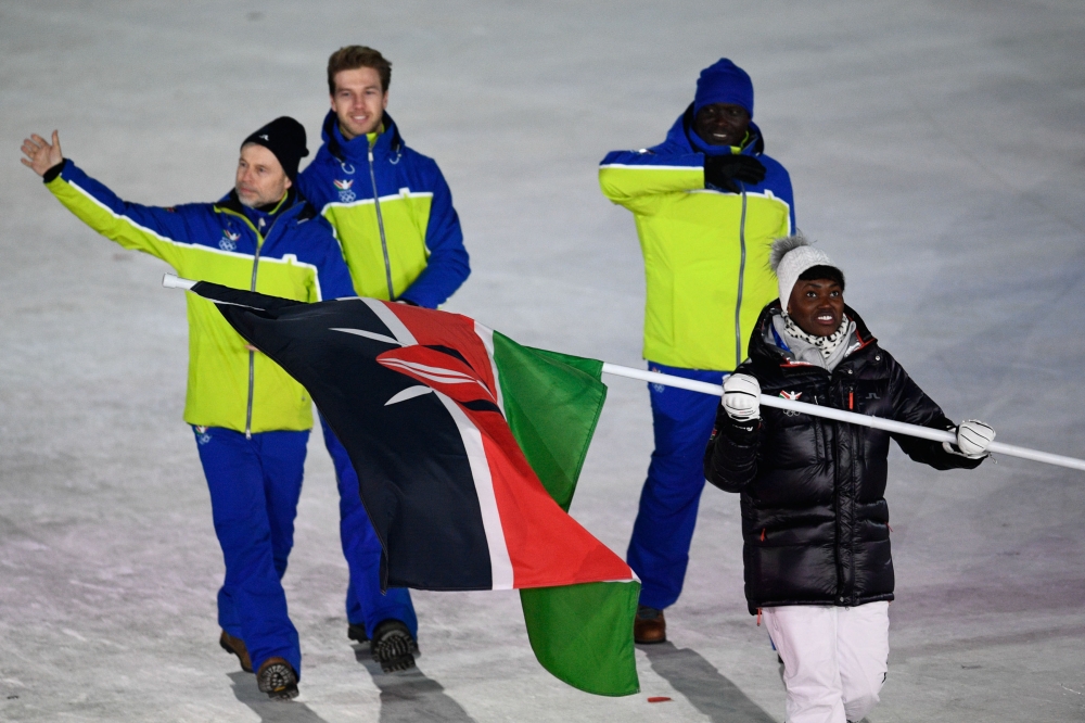 Kenya‘s flagbearer Sabrina Simader leads the delegation parade during the opening ceremony of the Pyeongchang 2018 Winter Olympic Games at the Pyeongchang Stadium on February 9, 2018. AFP / Martin Bureau
