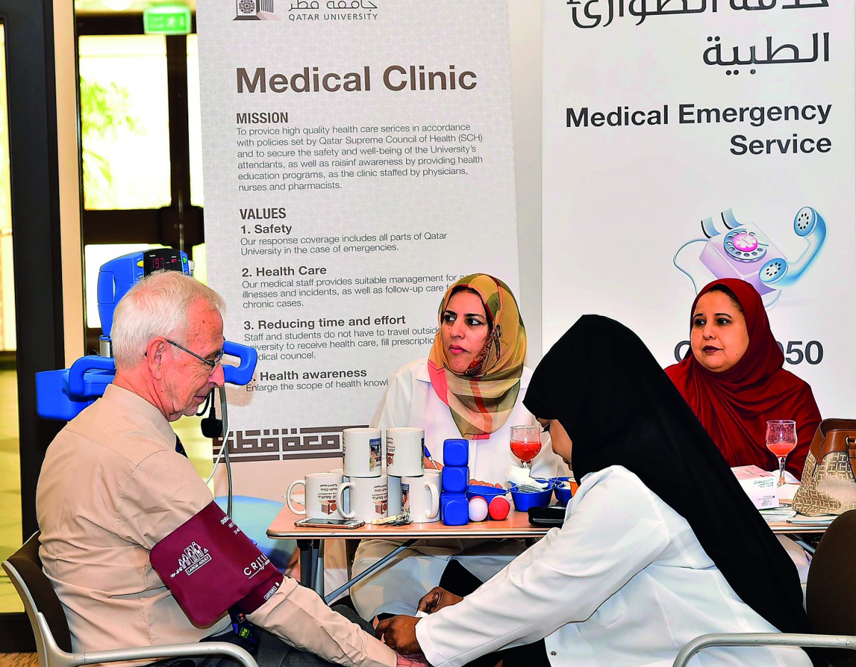 Health experts attending to a visitor during the event.