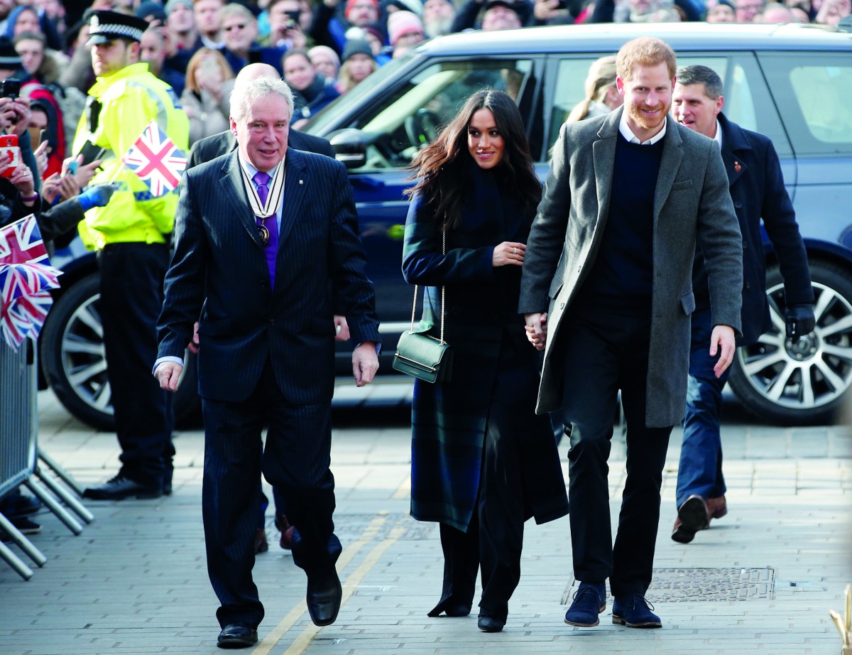 Britain's Prince Harry and his fiancee Meghan Markle arrive for a visit to the Social Bite, a social business and cafe, in Edinburgh, Scotland February 13, 2018. Reuters/Andrew Yates