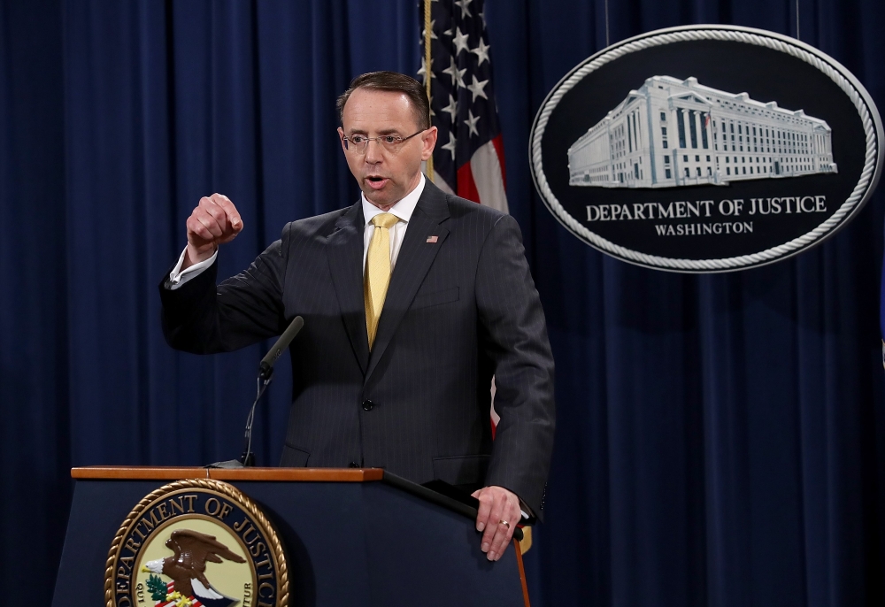 US Deputy Attorney General Rod Rosenstein announces the indictment of 13 Russian nationals and 3 Russian organizations for meddling in the 2016 US presidential election February 16, 2018 at the Justice Department in Washington, DC.Win McNamee/Getty Images