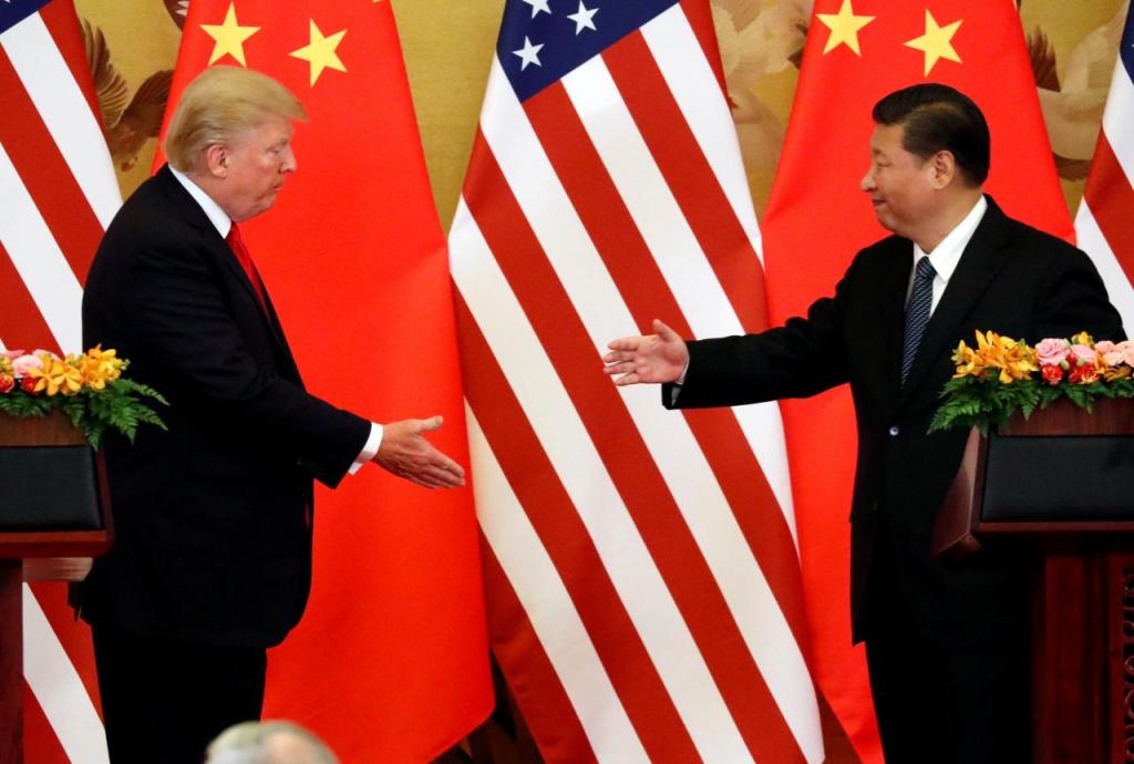 File photo of US President Donald Trump and China's President Xi Jinping make joint statements at the Great Hall of the People in Beijing, China, November 9, 2017. REUTERS/Jonathan Ernst